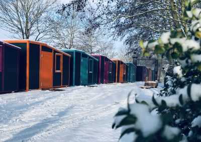 temporary accommodation in a row in the snow